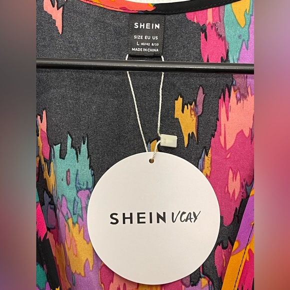 *SOLD* New with tags floral dress. - Picture 2 of 3